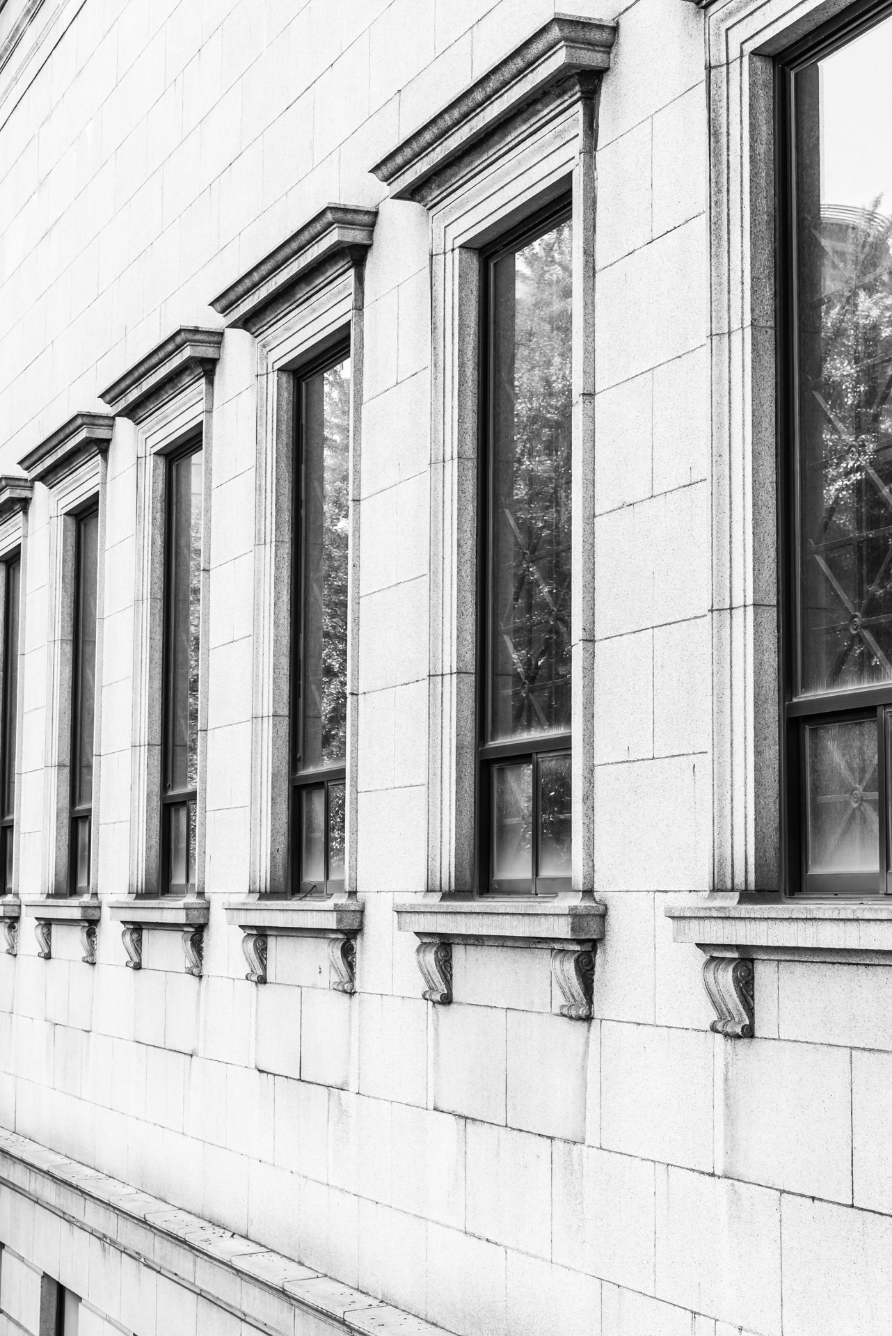 A row of classical stone window surrounds